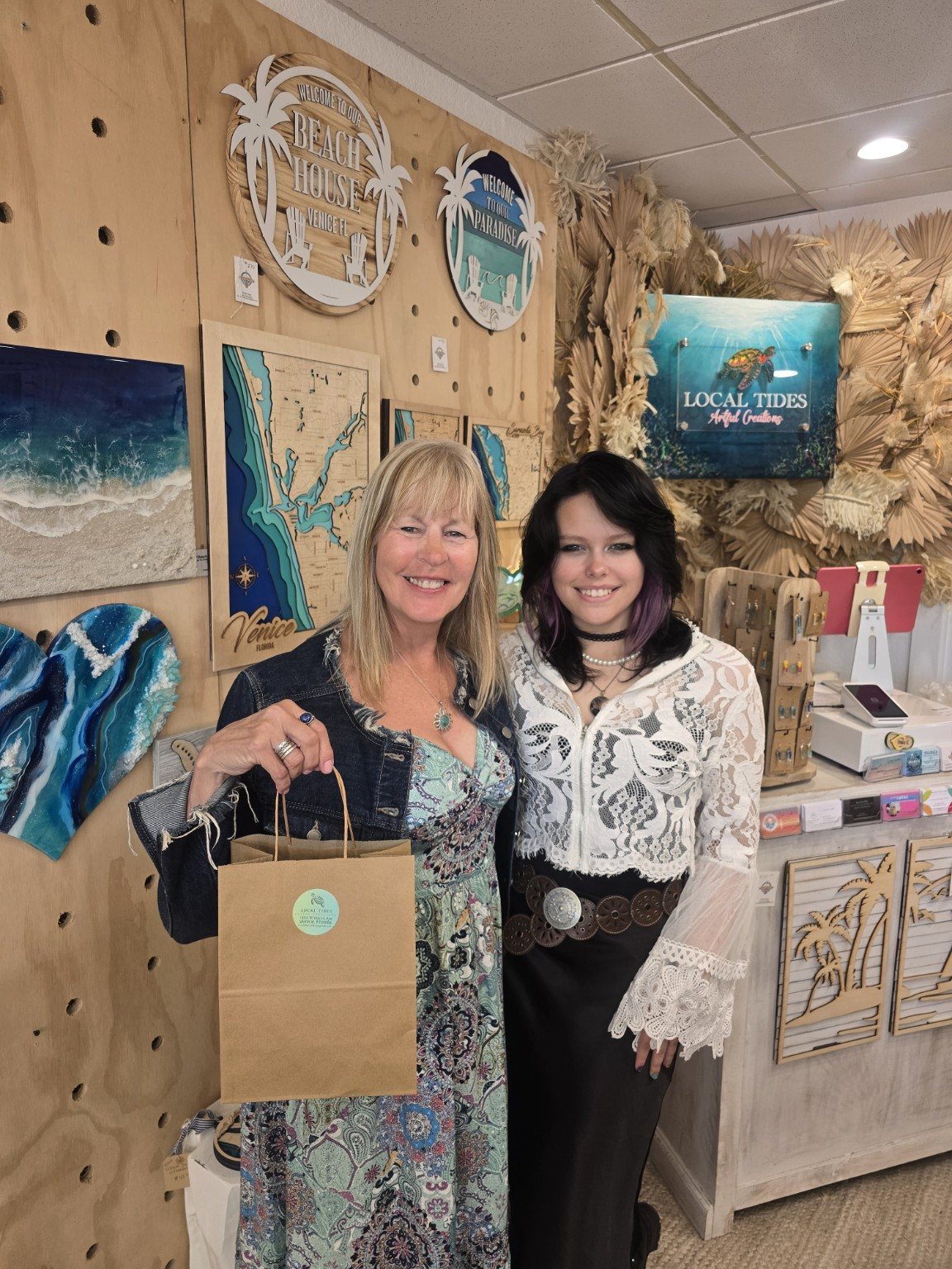 Visitors inside Local Tides Artful Creations